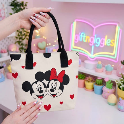 Open-top Mickey and Minnie Mouse heart print tote bag standing on a desk