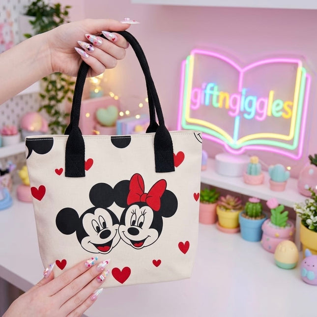 Open-top Mickey and Minnie Mouse heart print tote bag standing on a desk