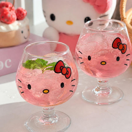 Collage of clear Hello Kitty character glasses with red and pink bows in serving scenes