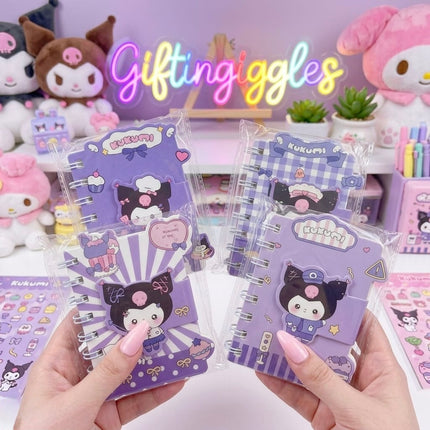 Two purple Kuromi spiral mini notebooks with illustrated covers