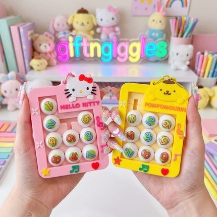 Pink and blue handheld number tile sliding puzzles