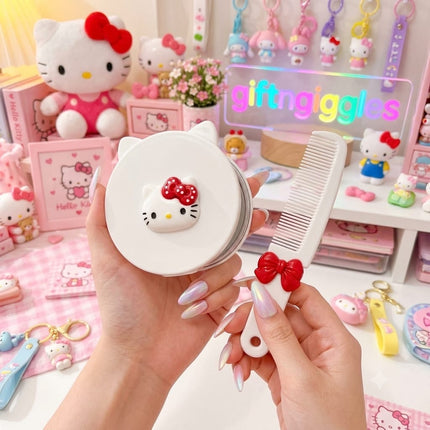 White and pink Hello Kitty-style mirror and comb designs viewed from the back