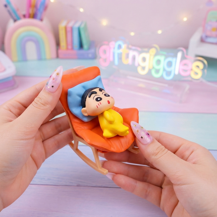 ✨👶 Crayon Shinchan Baby Nap Time Figurine on Rocking Chair - Cute Anime Collectible (Sold Individually) 🧸💤